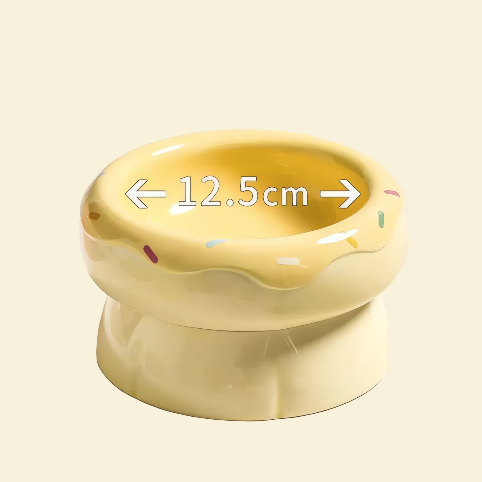Yellow donut-shaped pet bowl with a measurement label on a light background