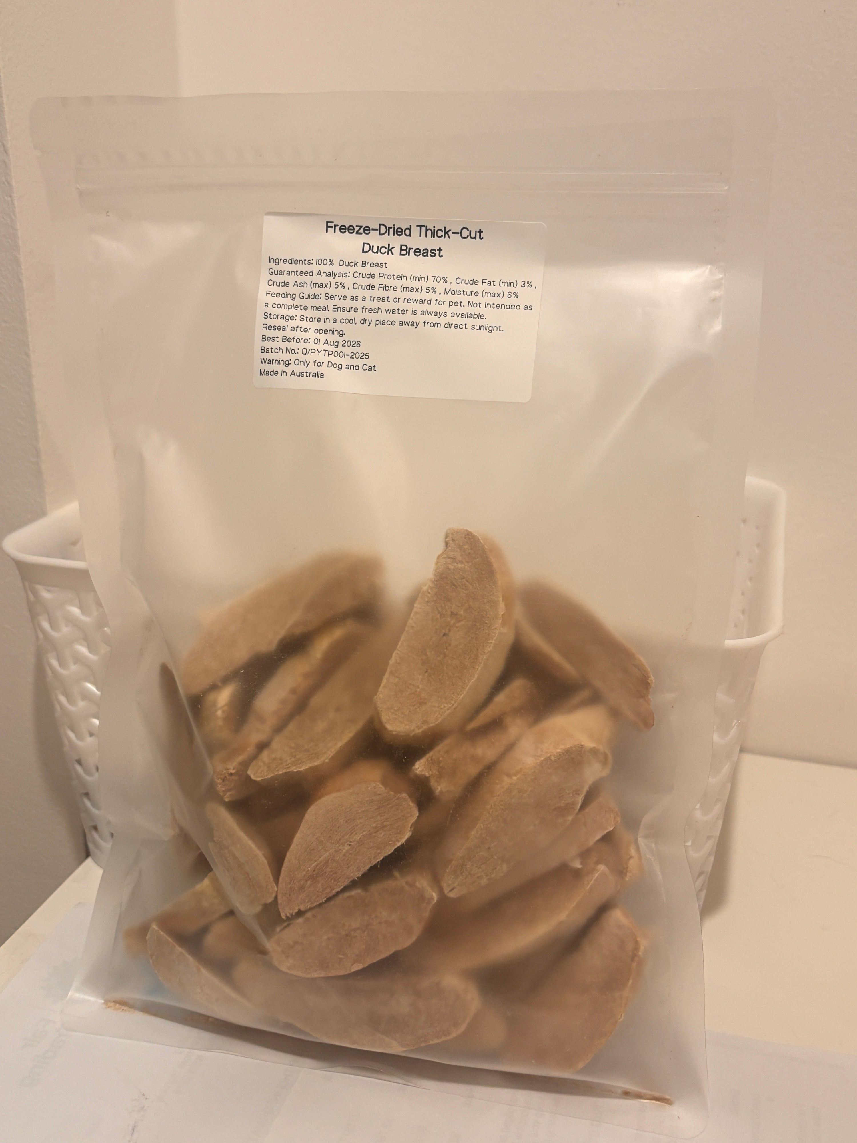 A clear, resealable 100g bag of Freeze-Dried Thick-Cut Duck Breast pet treats, featuring a printed label that highlights the 100 percent single-ingredient formula and Australian Made quality.