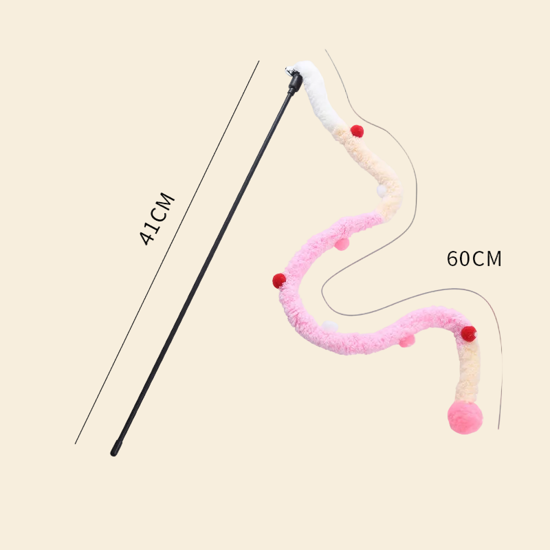 Full view of a black interactive cat teaser wand with an attached multi-colored plush tail in pink, cream, and white with numerous colorful pom-poms. Faint lines on the white background mark the dimensions: a line labeled "41cm" along the wand and a curved line labeled "60cm" showing the length of the slithering tail.