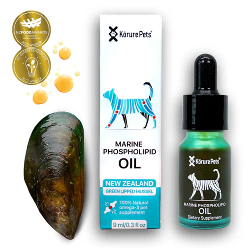 Kōrure Pets Marine Phospholipid Oil 9ml bottle and box next to a raw New Zealand Green Lipped Mussel shell. Features NZ Food Awards and UC Entrepreneurship winner badges.