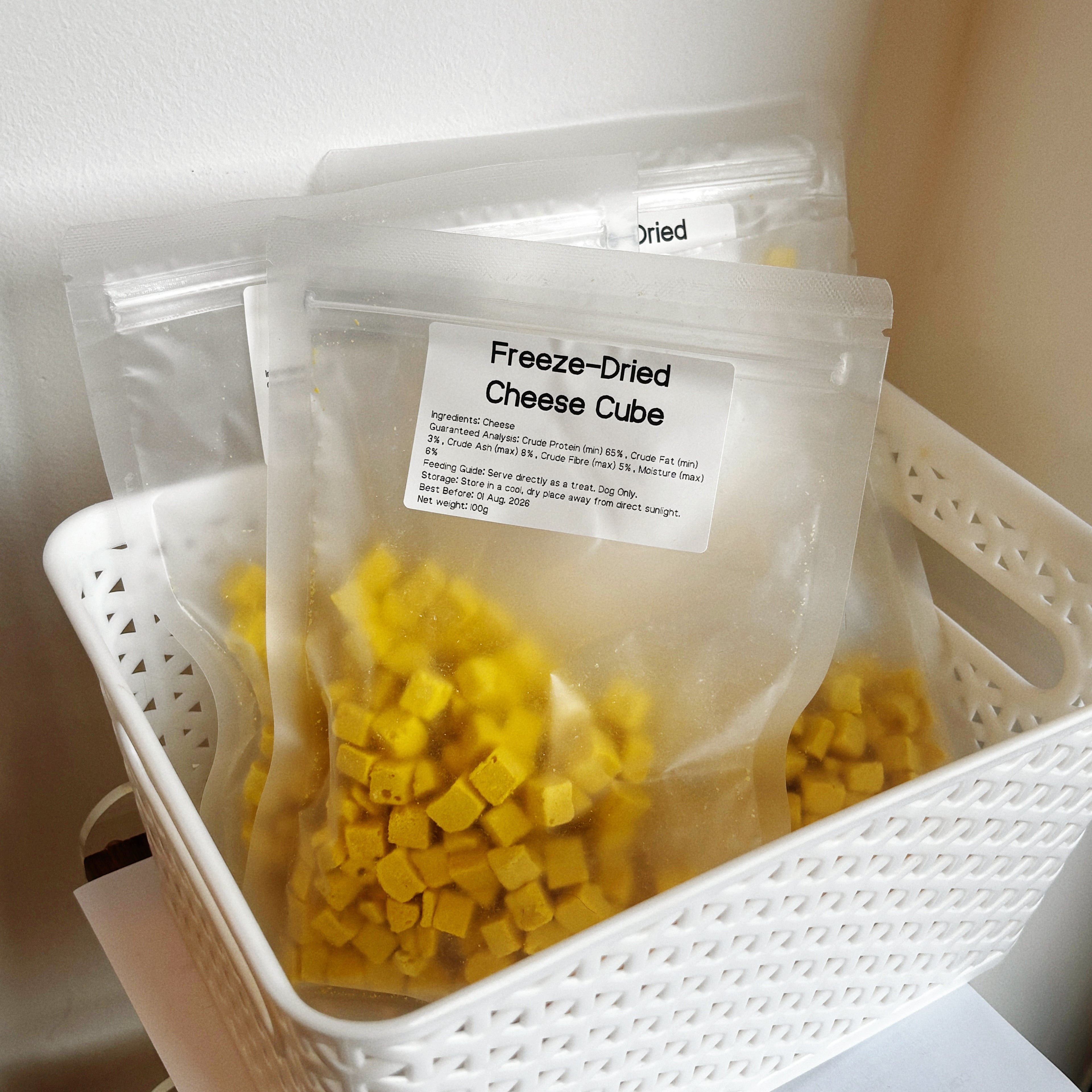 Multiple packs of Freeze-Dried Cheese, ideal as a gourmet kibble topper or high-protein snack for picky dogs.