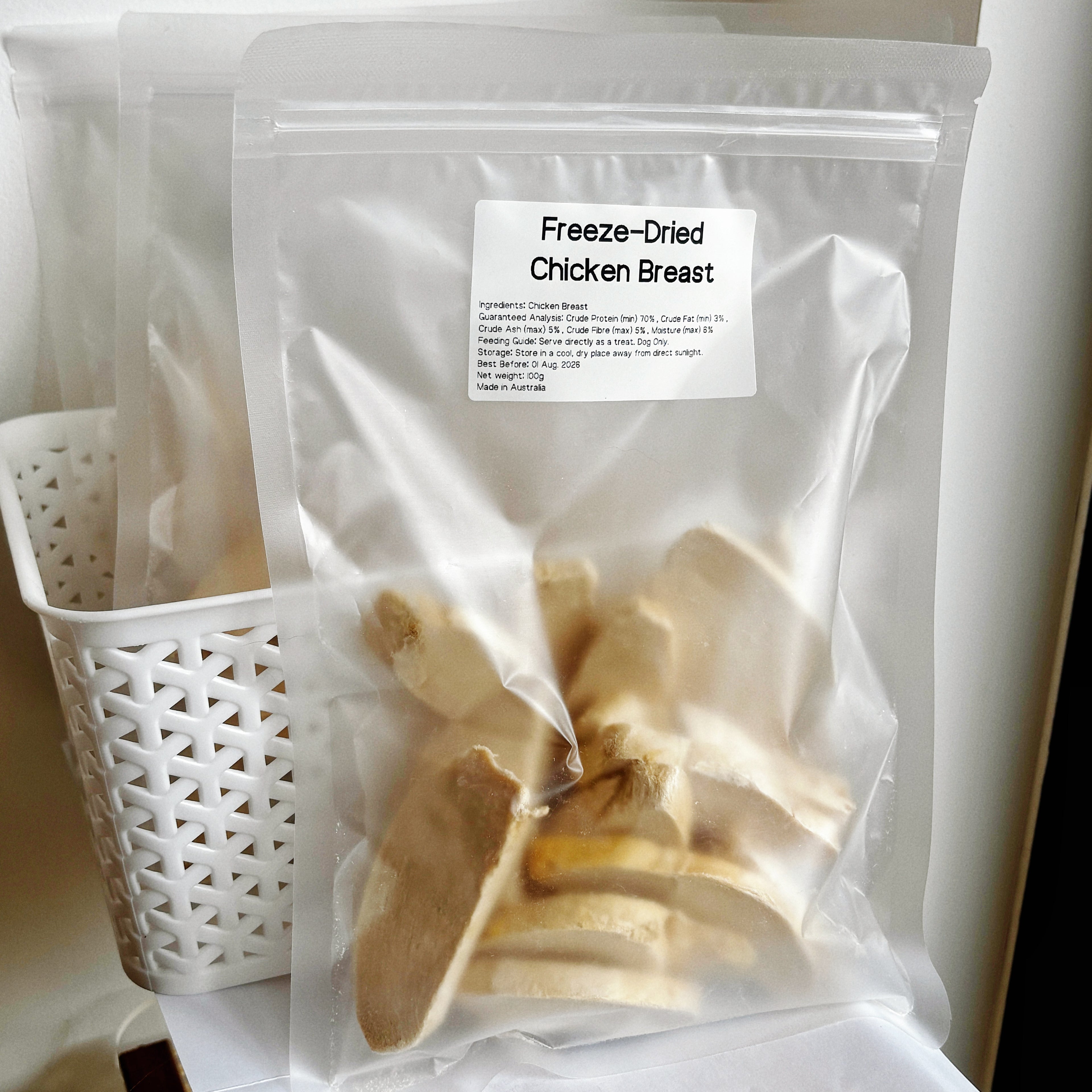 Single bag of Freeze-Dried Chicken Breast (100g) with label showing 70% protein content, single-ingredient treat for dogs with sensitive stomachs.