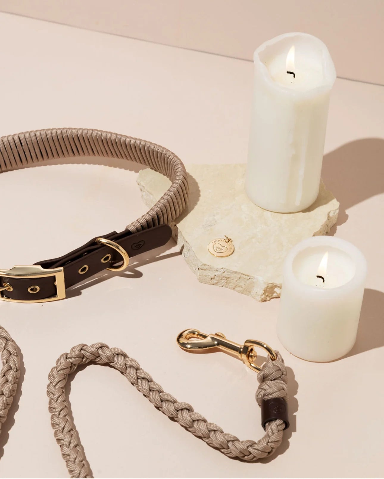 Detailed view of the mocha brown pet walking set. Showcases the unique layered look where tactical paracord meets premium vegan leather, accented with rust-resistant gold clasps