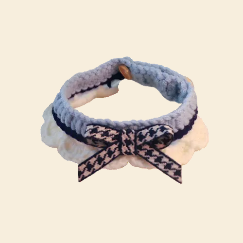 Cloud-Soft Knitted Pet Bib in Navy Blue. Features a lightweight, anxiety-free design with a secure, fur-safe button closure