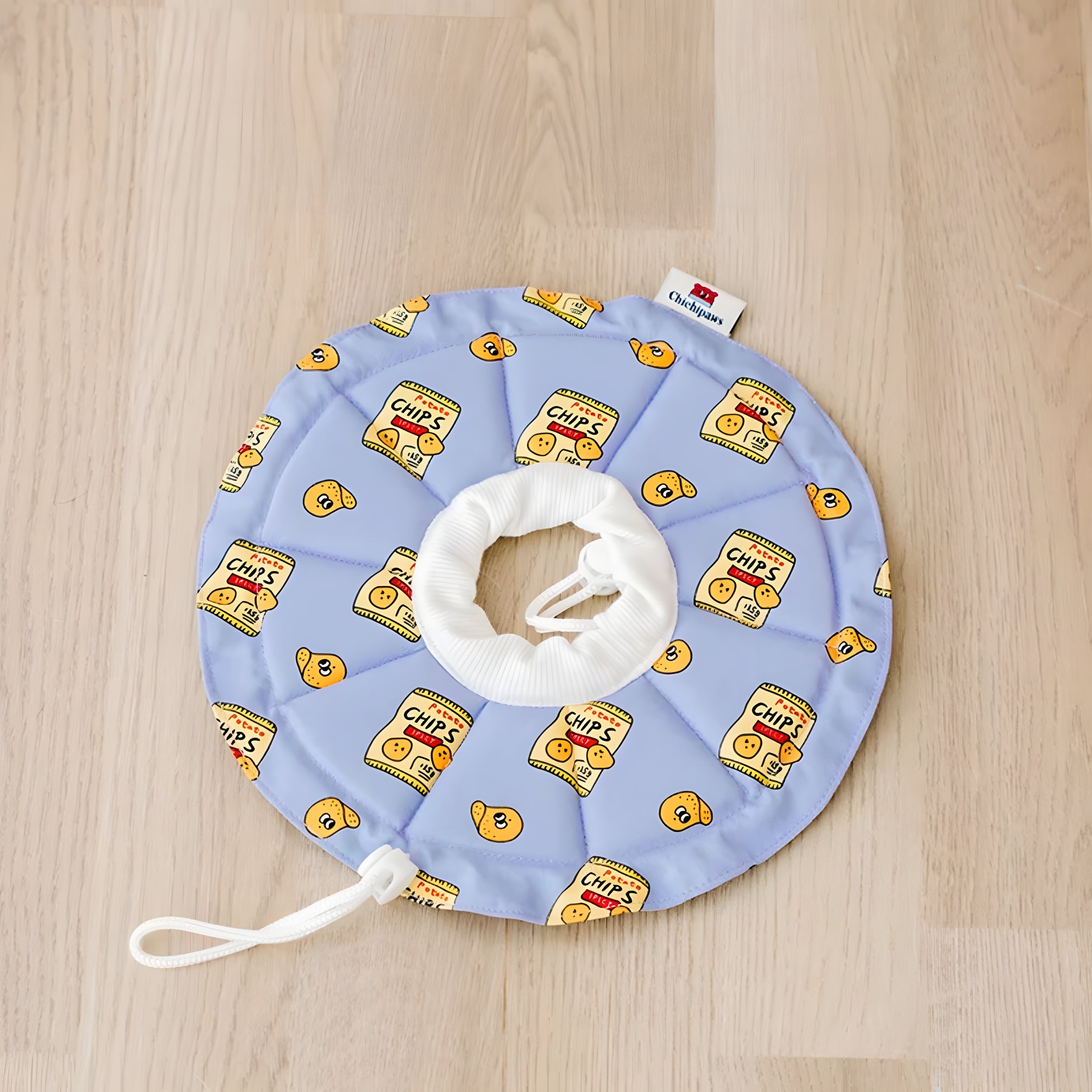 Soft Recovery Collar in Potato Chips print. A lightweight, sensory-friendly alternative to hard cones that blocks peripheral vision