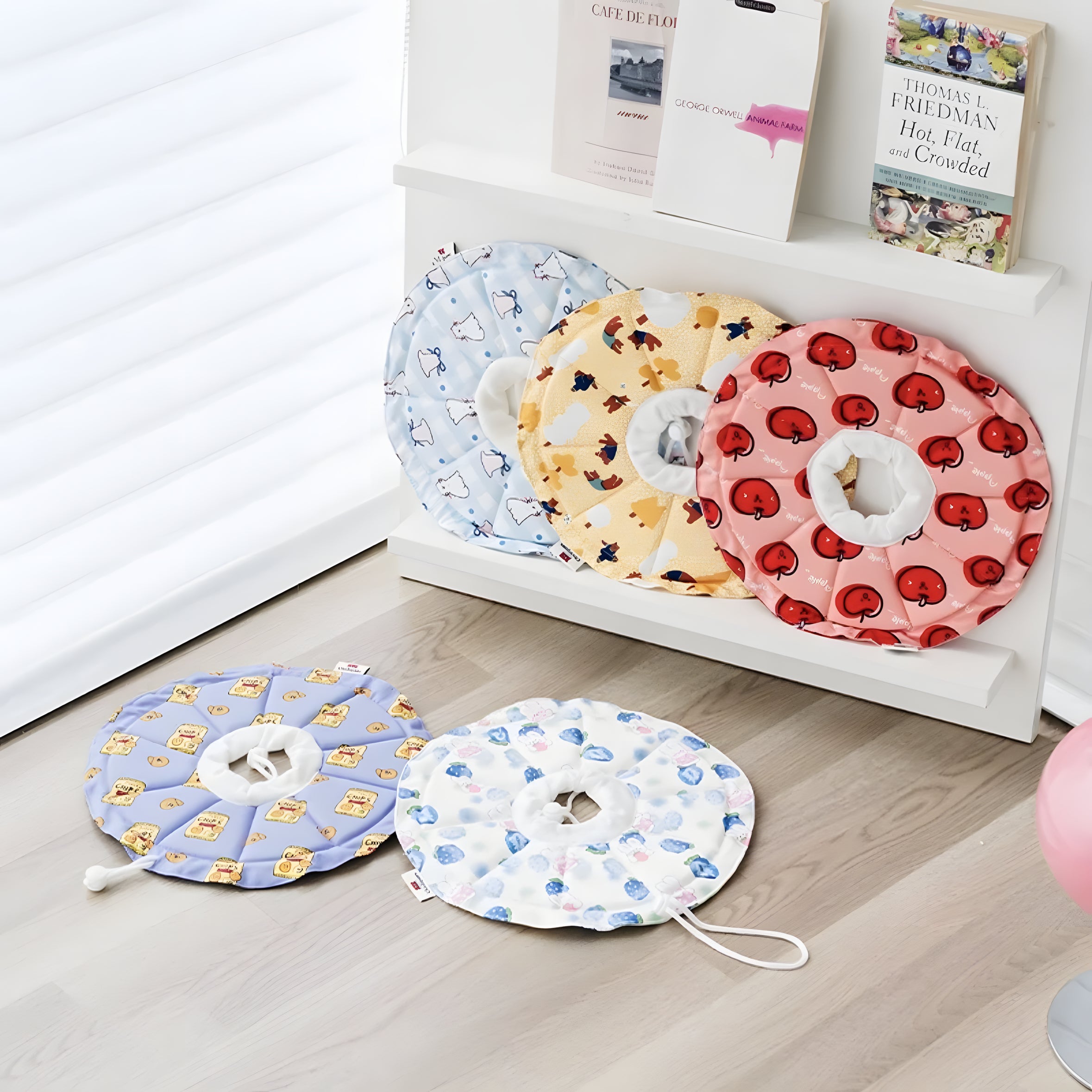 Collection of Soft Elizabeth Collars in cute prints (Chips, Apple, Bear, Rabbit). A water-resistant, pillow-like alternative to the plastic cone of shame
