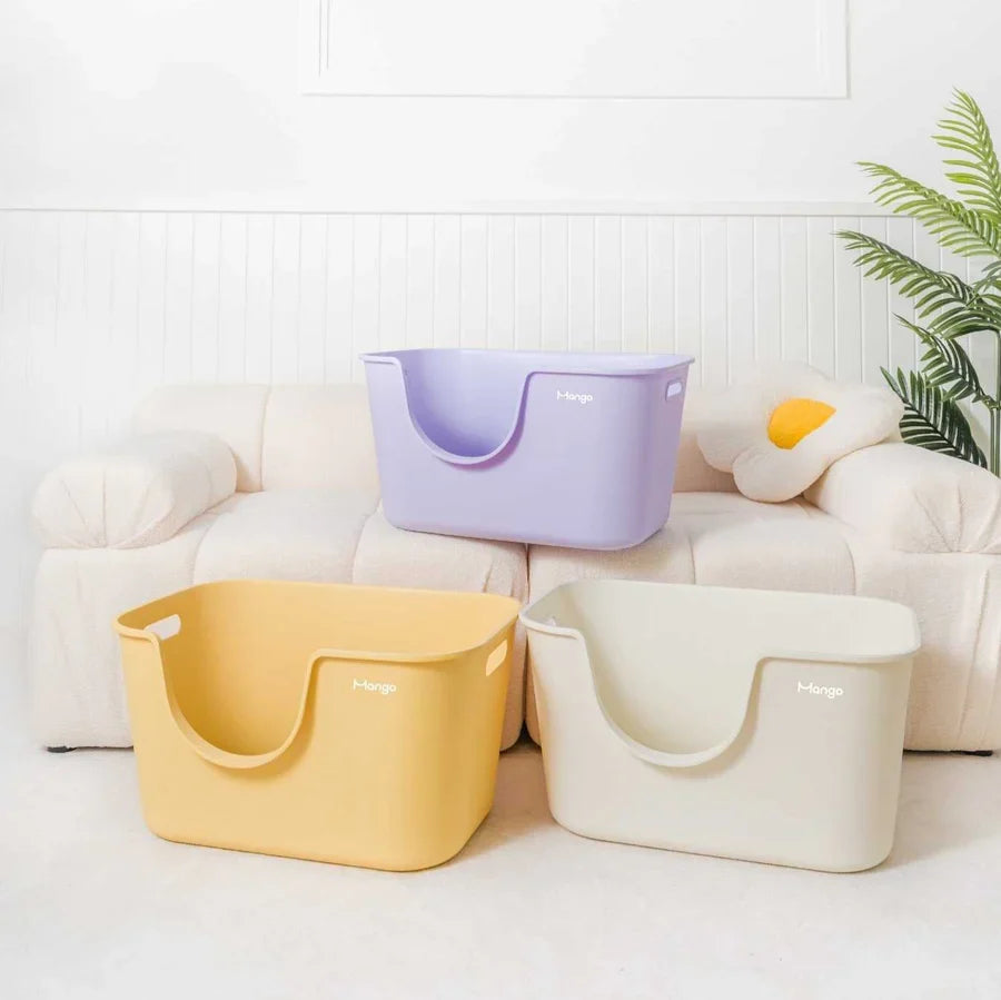 Mango Butter Large Cat Litter Box colour collection in yellow, purple and cream, featuring built-in side handles and a spacious open-top design
