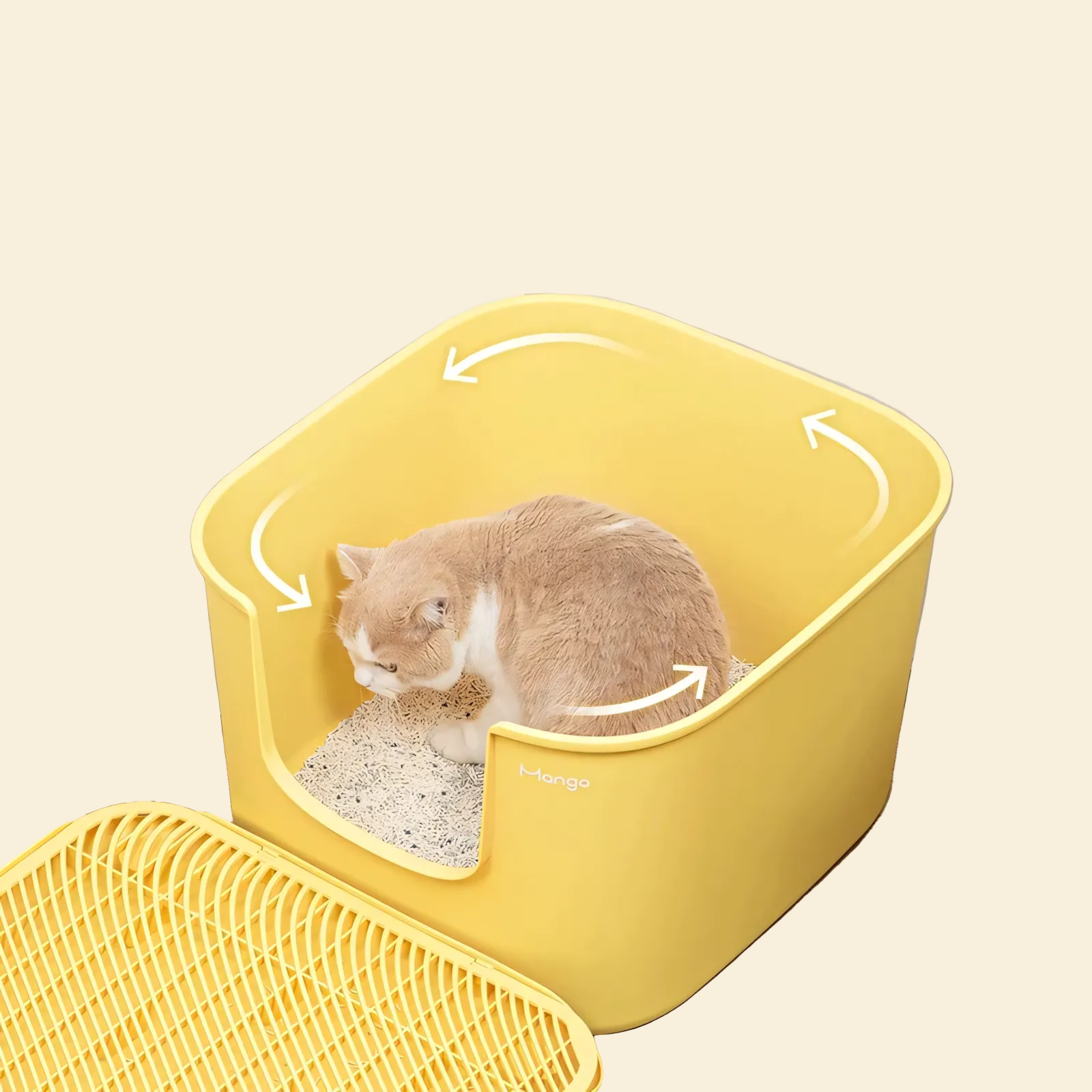 An orange and white cat comfortably turning around inside the spacious yellow Mango Cube litter box, highlighting the extra-large 55x50cm interior.