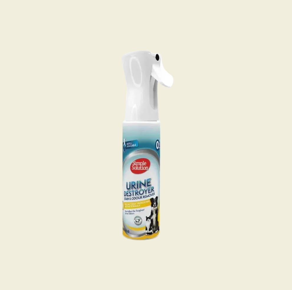Front view of the 400ml Simple Solution Urine Destroyer bottle, featuring the unique Flairosol trigger, a dog and cat, and highlighting its 0% gas and Pro-Bacteria enzyme formula.