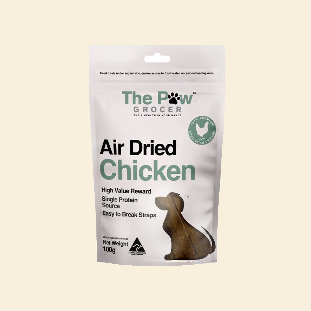 Front packaging of The Paw Grocer Air Dried Chicken Straps (100g). High-value training reward, single protein source, and easy-to-break straps for dogs.