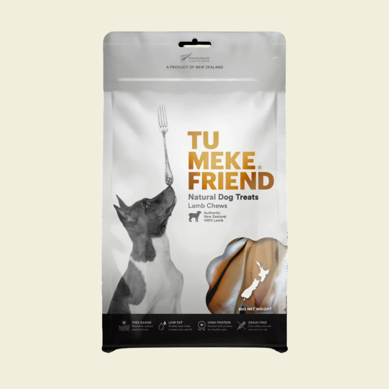 Front packaging of TU MEKE FRIEND Air-Dried Lamb Chews (80g), featuring a dog balancing a fork on its nose and a clear window displaying the natural lamb ear treats.
