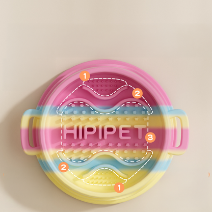 A top-down view of the vibrant silicone slow feeder bowl with dashed lines and numbers highlighting the three distinct feeding zones for kibble, wet food, and tongue scraping.