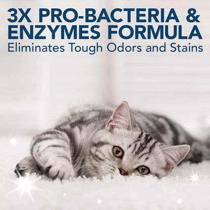 A grey tabby cat resting comfortably on a clean, fluffy white rug, with text emphasizing the 3X Pro-Bacteria and Enzymes formula that eliminates tough odors and stains.