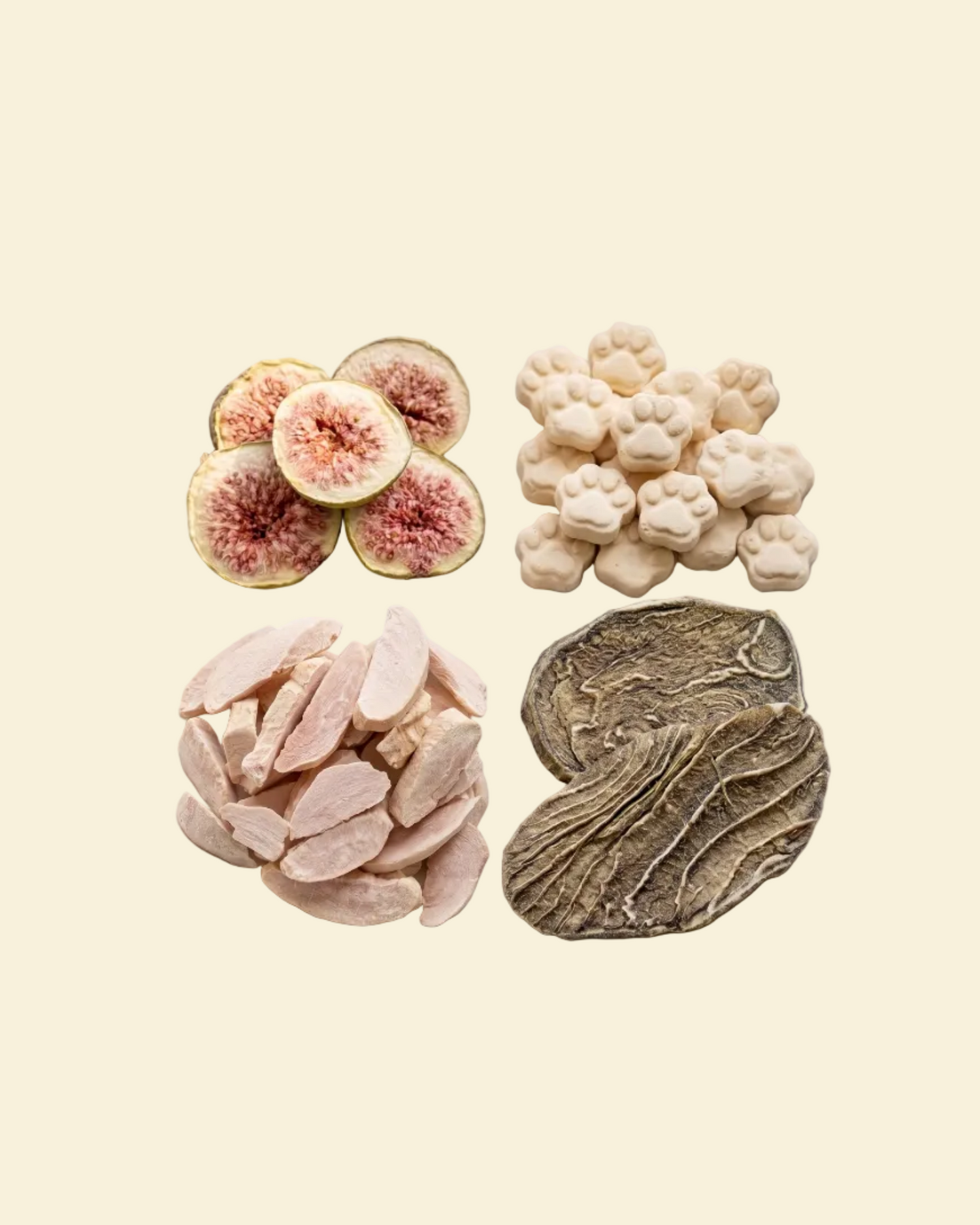 Assorted pet treats including fig slices, paw-shaped cookies, and pieces of meat on a white plate.