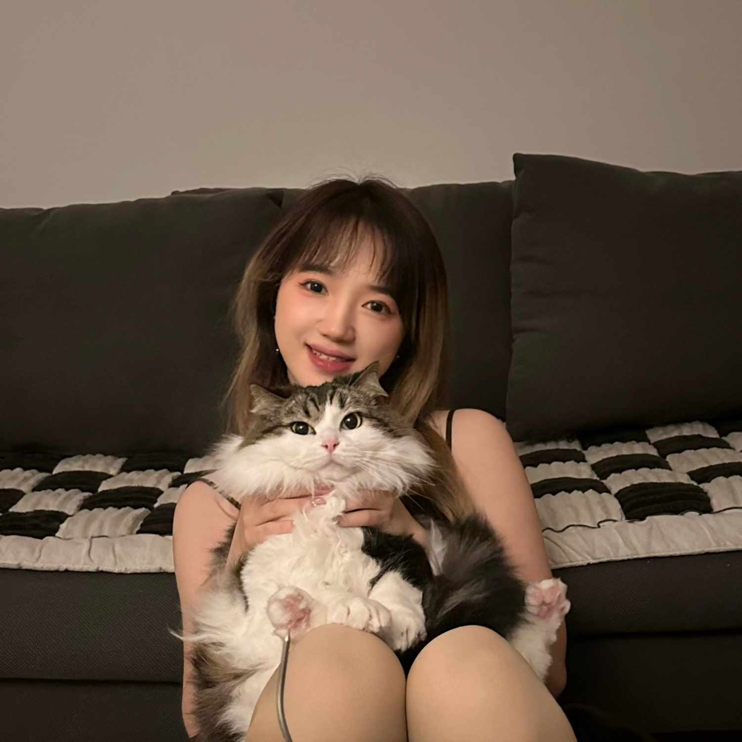 The founder of LéJoyee with her cat