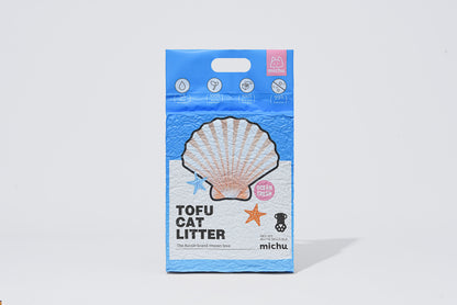Package of tofu cat litter with a shell design on a light gray background