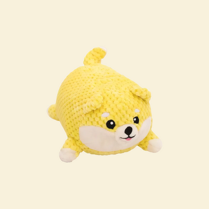 Yellow plush toy with a dog design on a white background