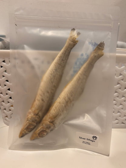 A real-world photo of the 30g Freeze-Dried Silver Sillago pouch, showing the simple "Silver Sillago" label with a paw print and the "Best Before" date, emphasizing its clean, Australian-made quality.