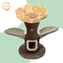A beautiful Camily Sunflower Cat Tree featuring a large yellow floral platform, green leaf steps, and a brown tree trunk hideaway, set against a pastel green and white graphic background.