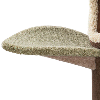 Cat tree with a green cushioned platform on a white background
