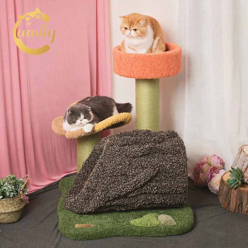 Two cats relaxing on the Camily Flower Grove Cat Tree. A grey and white cat lounges comfortably on the flower platform while an orange cat surveys the room from the high top-tier lookout.