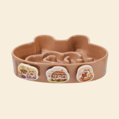 Brown pet bowl with cartoon designs on a white background