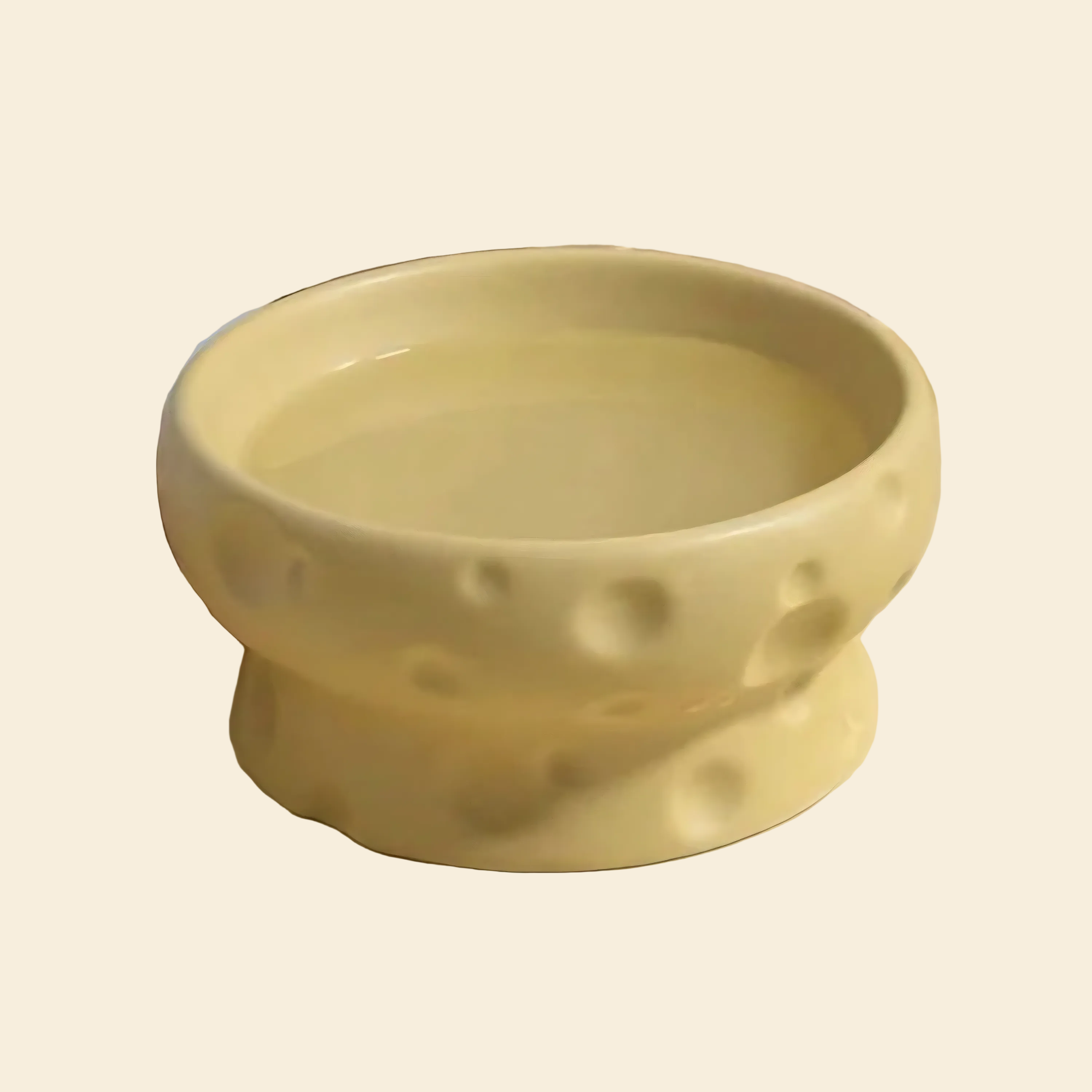 Yellow ceramic bowl with cheese surface
