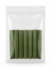 A clear, resealable pouch neatly packed with green freeze-dried cat grass sticks, highlighting the natural, mess-free alternative to growing live indoor cat grass.
