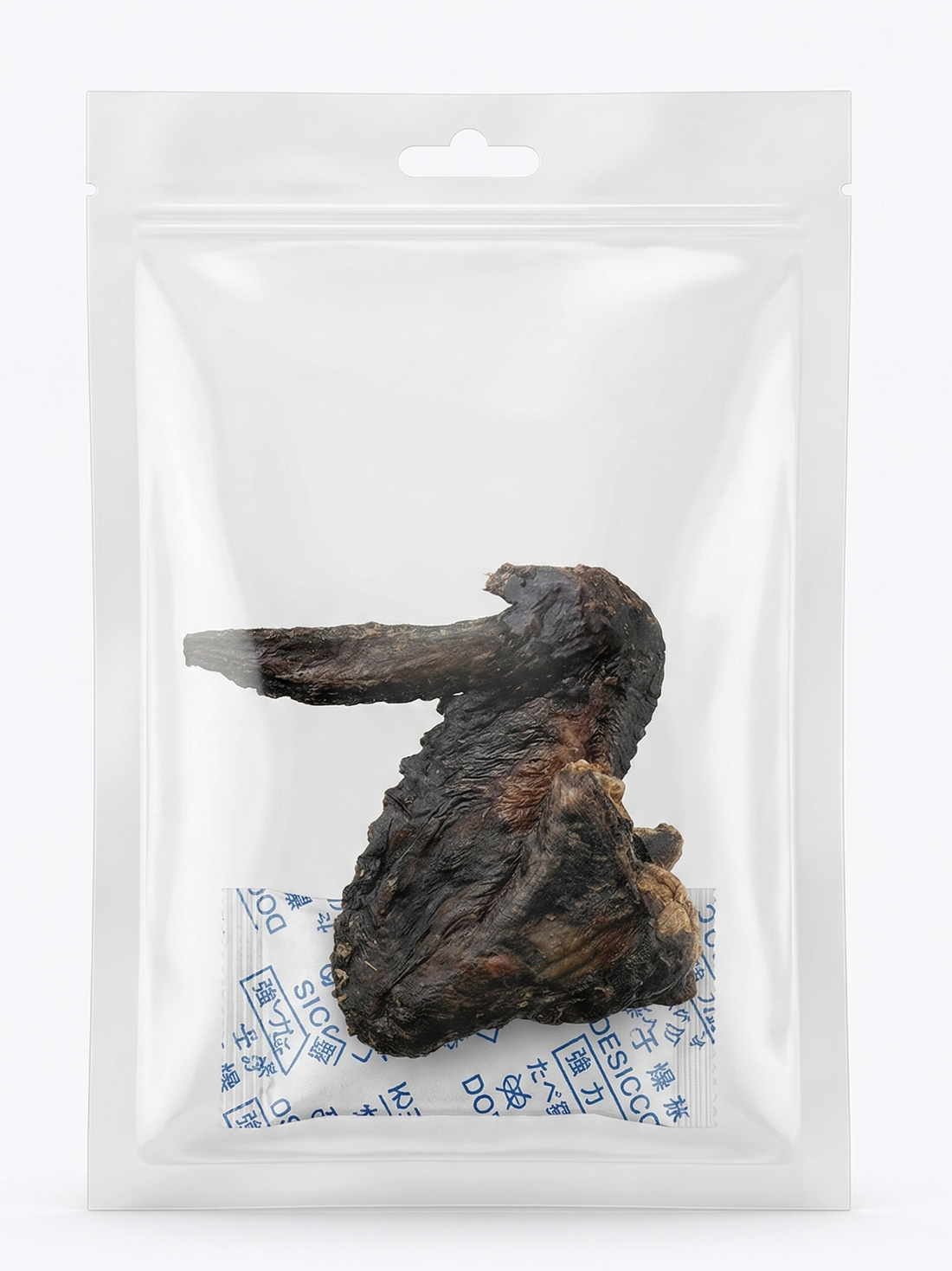 A clear, resealable pouch containing a single, dark-colored freeze-dried Silkie chicken wing with a desiccant packet, emphasizing its single-ingredient purity and natural dental crunch.