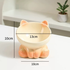 A peach-colored elevated ceramic cat bowl displaying its measurement labels, highlighting the 13cm width and 10cm stable base.