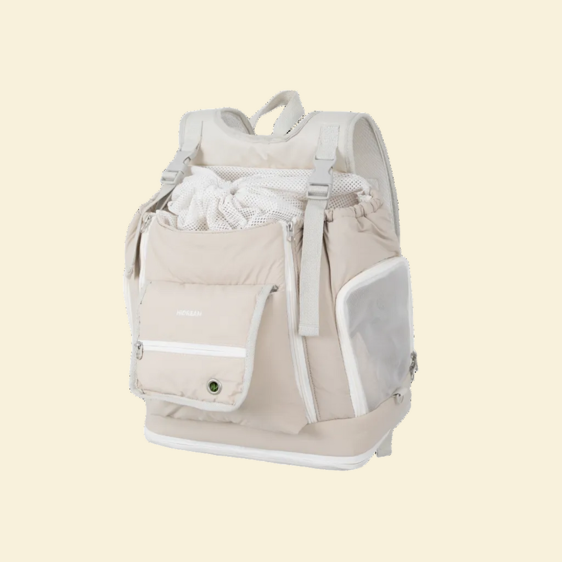 Detailed product shot of the beige ergonomic pet front carrier backpack, featuring an escape-proof drawstring mesh top, breathable side panels, and a zippered treat pocket.