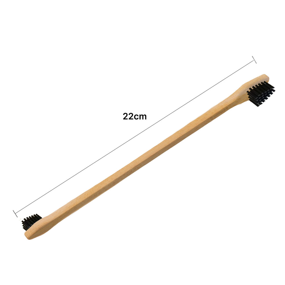 A dimension guide for the Essential Dog bamboo pet toothbrush, showing its 22cm ergonomic length and featuring the sustainable bamboo handle with soft black nylon bristles on both ends.