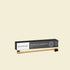 The Essential Dog double-sided bamboo pet toothbrush displayed in front of its sleek black packaging box, highlighting the ultra-soft dual small and large brush heads.