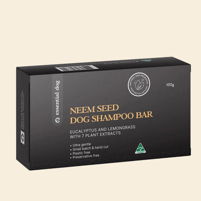 100g box of Essential Dog Neem Seed Shampoo Bar. A handcrafted, plastic-free solid bar scented with eucalyptus and lemongrass for a zero-waste, antibacterial wash