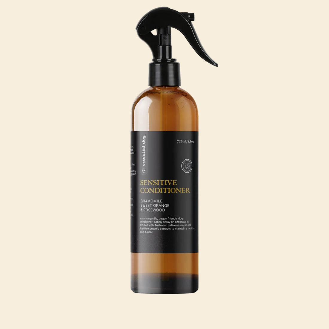 250ml bottle of Essential Dog Sensitive Skin Conditioner. A plant-based leave-in spray formulated with chamomile and sweet orange to detangle knots without rinsing.