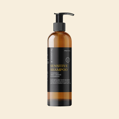 250ml bottle of Essential Dog Sensitive Shampoo. An ultra-gentle, plant-based formula with chamomile, sweet orange, and rosewood specifically designed to cleanse without irritation