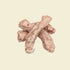 A close-up view of four premium freeze-dried chicken necks on a white background, highlighting their natural crunchy texture that acts as a dental chew for cats and dogs.