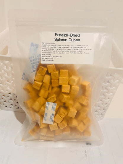 A clear, resealable 50g bag of Freeze-Dried Salmon Cubes, featuring a printed label that details the 100 percent salmon formula, 70 percent minimum crude protein, and Australian Made quality.