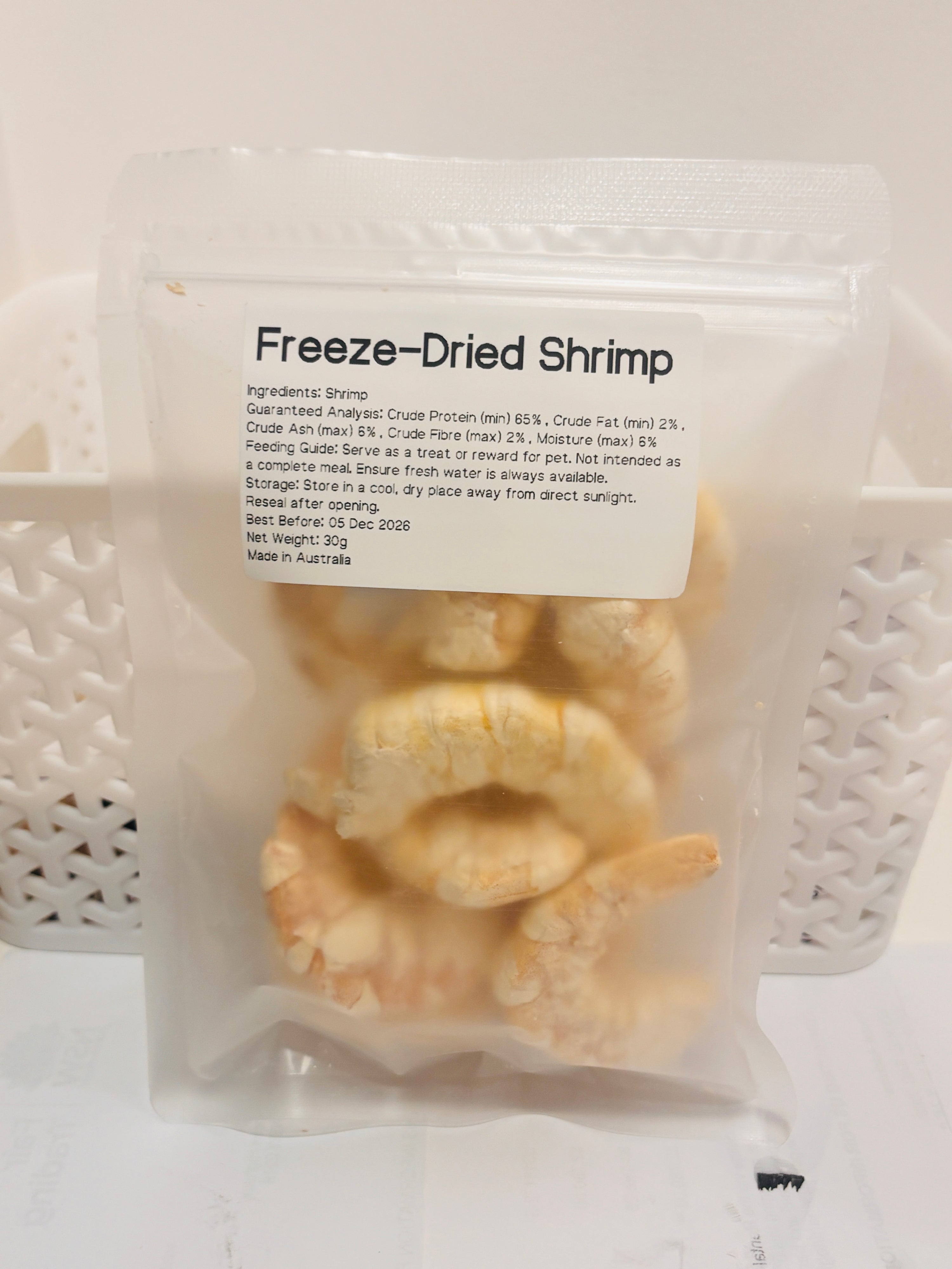 A clear, resealable 30g bag of Freeze-Dried Shrimp treats, featuring a printed label that details the 100 percent shrimp formula, 65 percent minimum crude protein, and Australian Made quality.