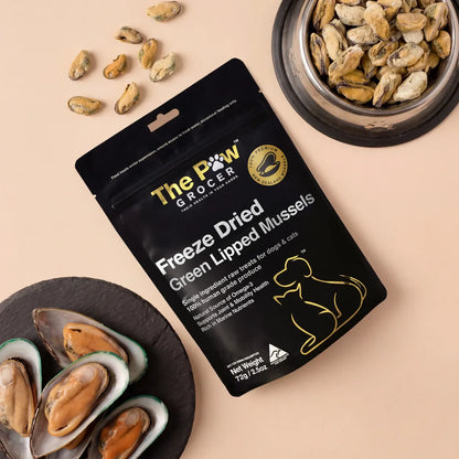 Aesthetic top-down view of green-lipped mussels in shells alongside freeze-dried mussel treats in a bowl. Natural source of glucosamine and chondroitin for pet arthritis relief and hip support.