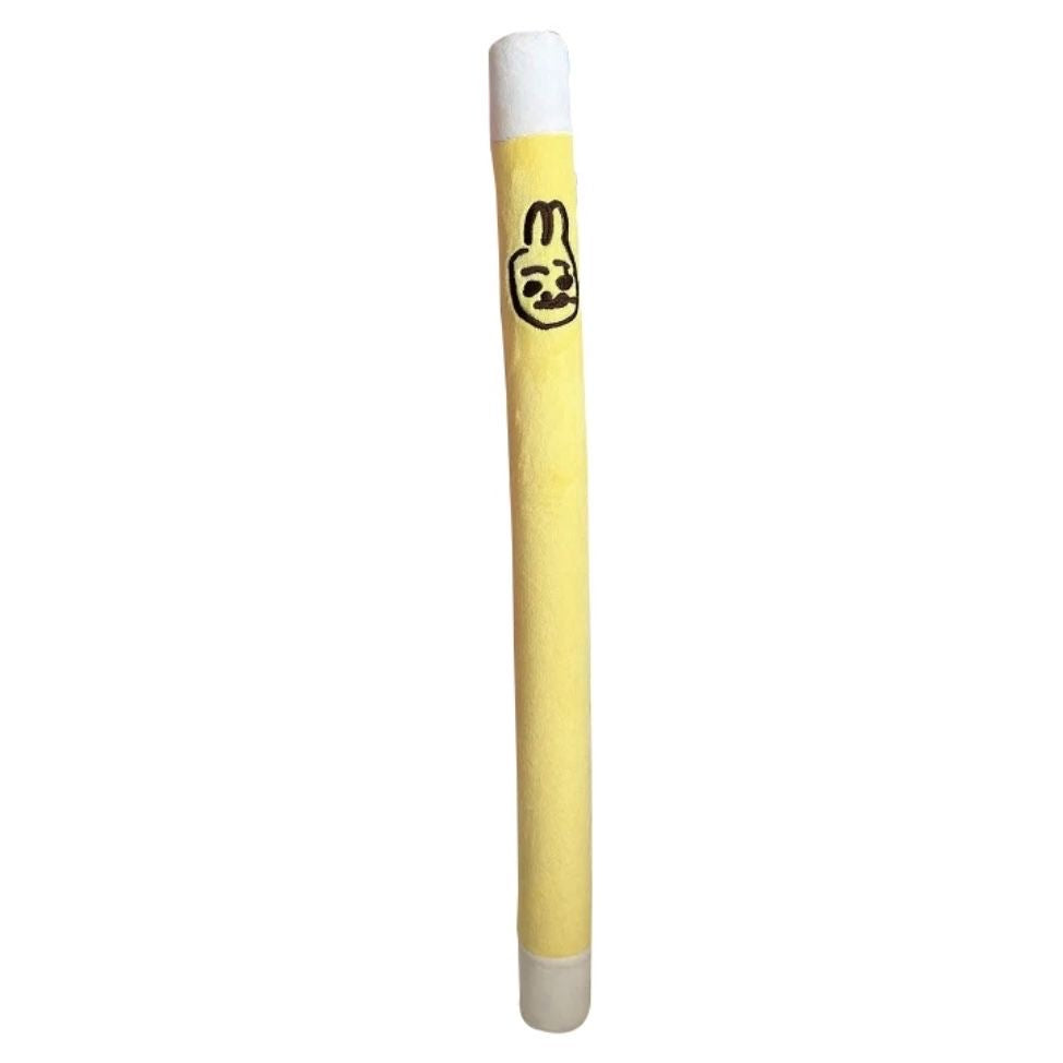 A clean studio shot of the kawaii yellow rabbit plush pet kicker wand against a white background, highlighting its soft, bite-resistant material and elongated shape.