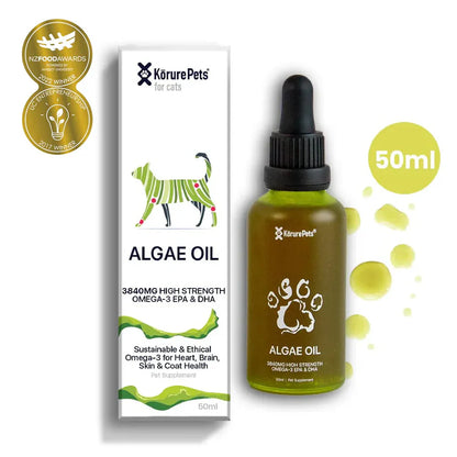 Kōrure Pets Algae Oil 50ml bottle and packaging alongside NZ Food Awards and UC Entrepreneurship winner badges. A sustainable, 100% plant-based Omega-3 supplement for cats.