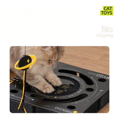 A long-haired cat using the high-density scratching pad on the black 3-in-1 Busy Box. Designed to redirect scratching energy away from furniture