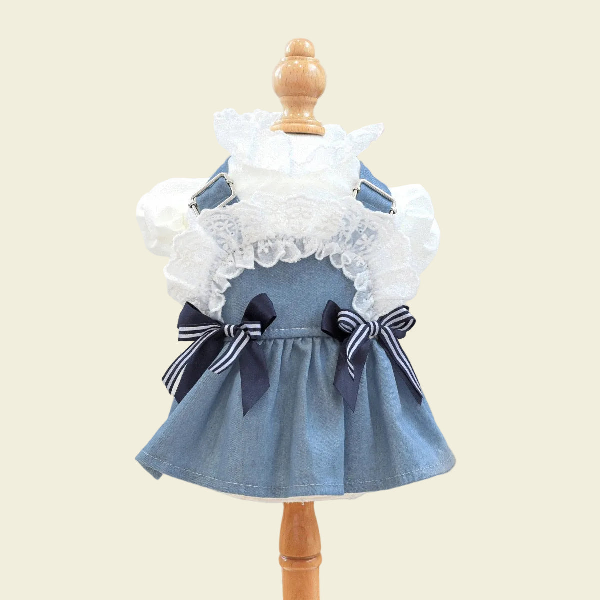 Front view of the nautical pet dress on a mannequin. Highlights the adjustable straps for a custom fit and the sleeveless open-back design for maximum airflow during heat-waves