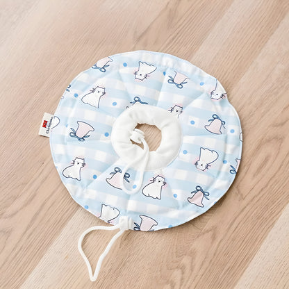 Blue checkered soft cat cone with cute rabbit illustrations. Designed to protect wounds and hot spots without causing stress