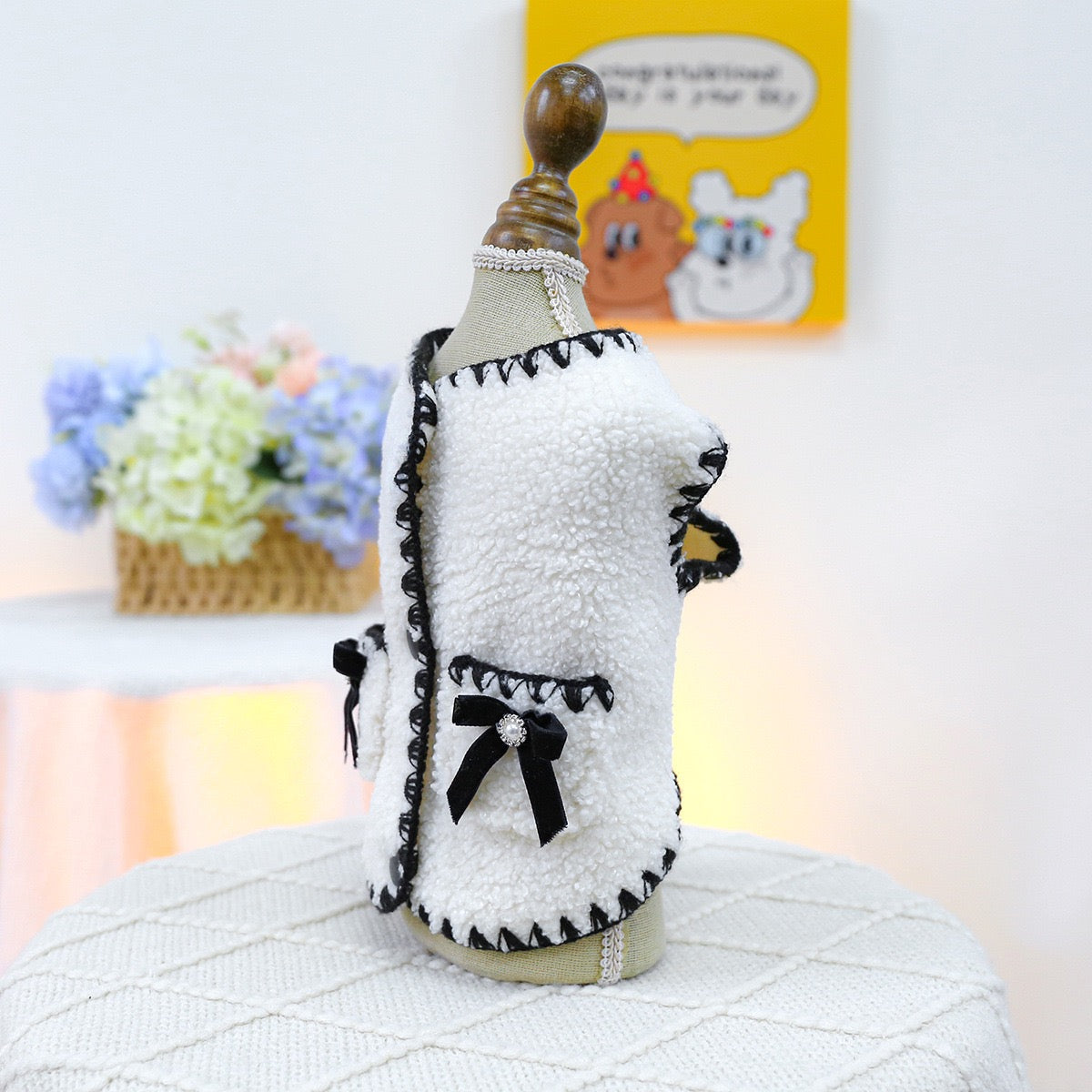 Profile view of the Little Fragrance vest on a mannequin, highlighting the cute functional pockets and the overall &