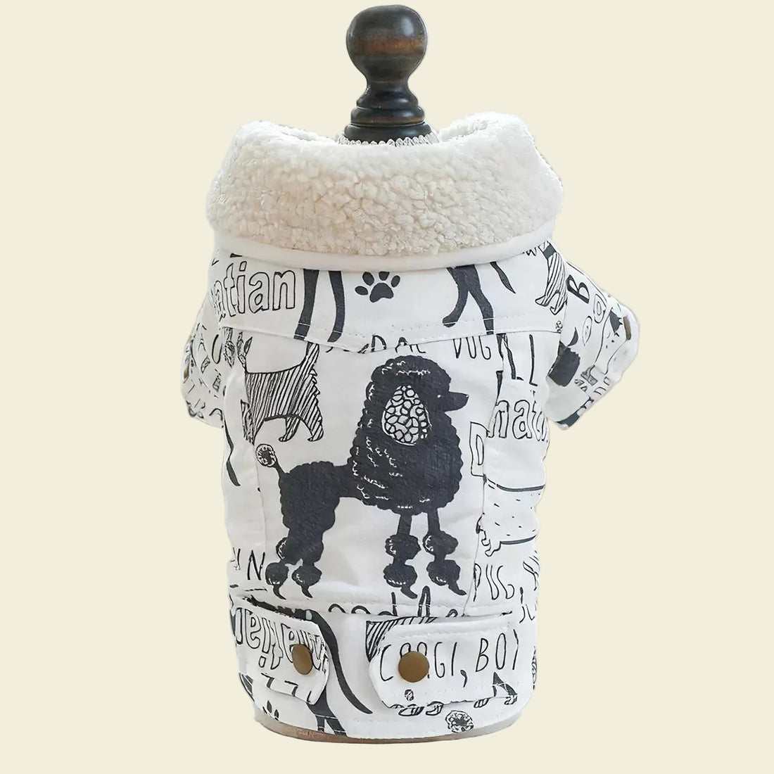 Back view of the tailored dog parka on a mannequin. Shows the urban street art vibes and high-contrast doodle print for big-personality dogs.