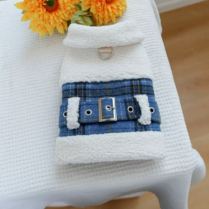 Folded view of the blue and amber tartan dog jacket. Highlights the thick, warm texture and the polished central buckle detail