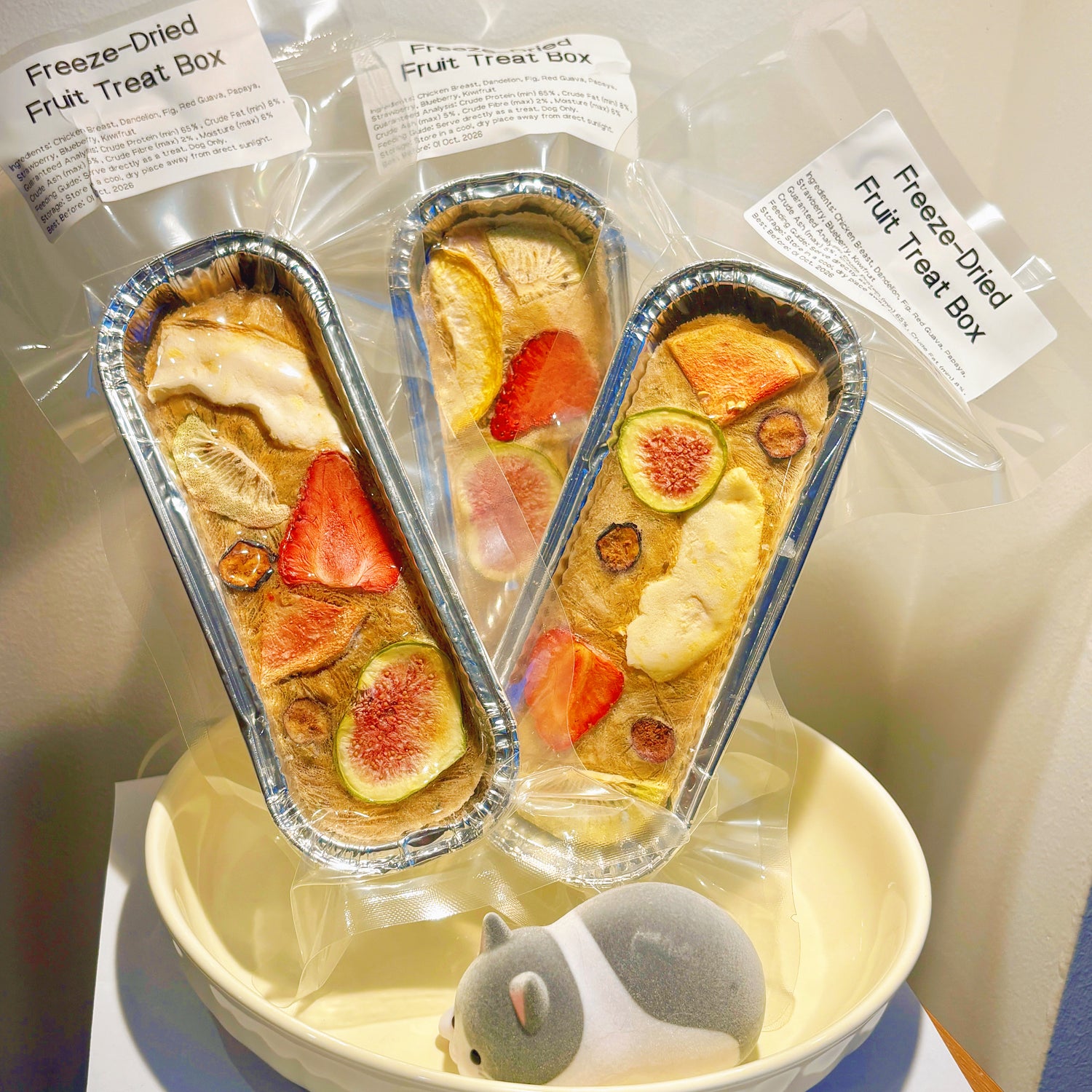 A luxury gourmet dog gift box containing freeze-dried fruit and chicken bars, perfect for dog birthdays and special occasions.