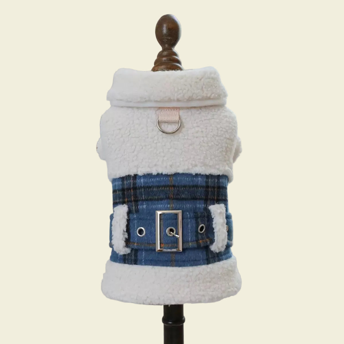 Back view of the British Heritage Plaid Jacket on a mannequin. Shows the reinforced D-ring for leash attachment and the structured wool-touch fabric